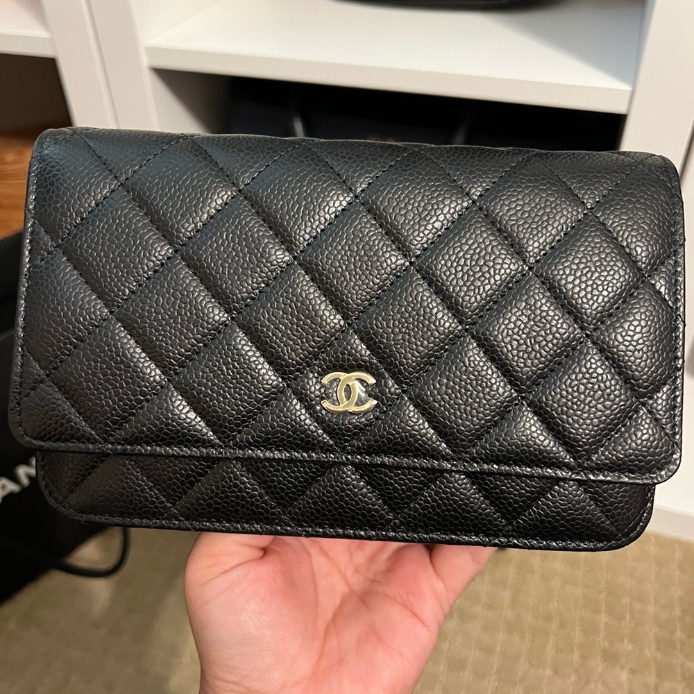 Black caviar champagne gold hardware Chanel WOC.